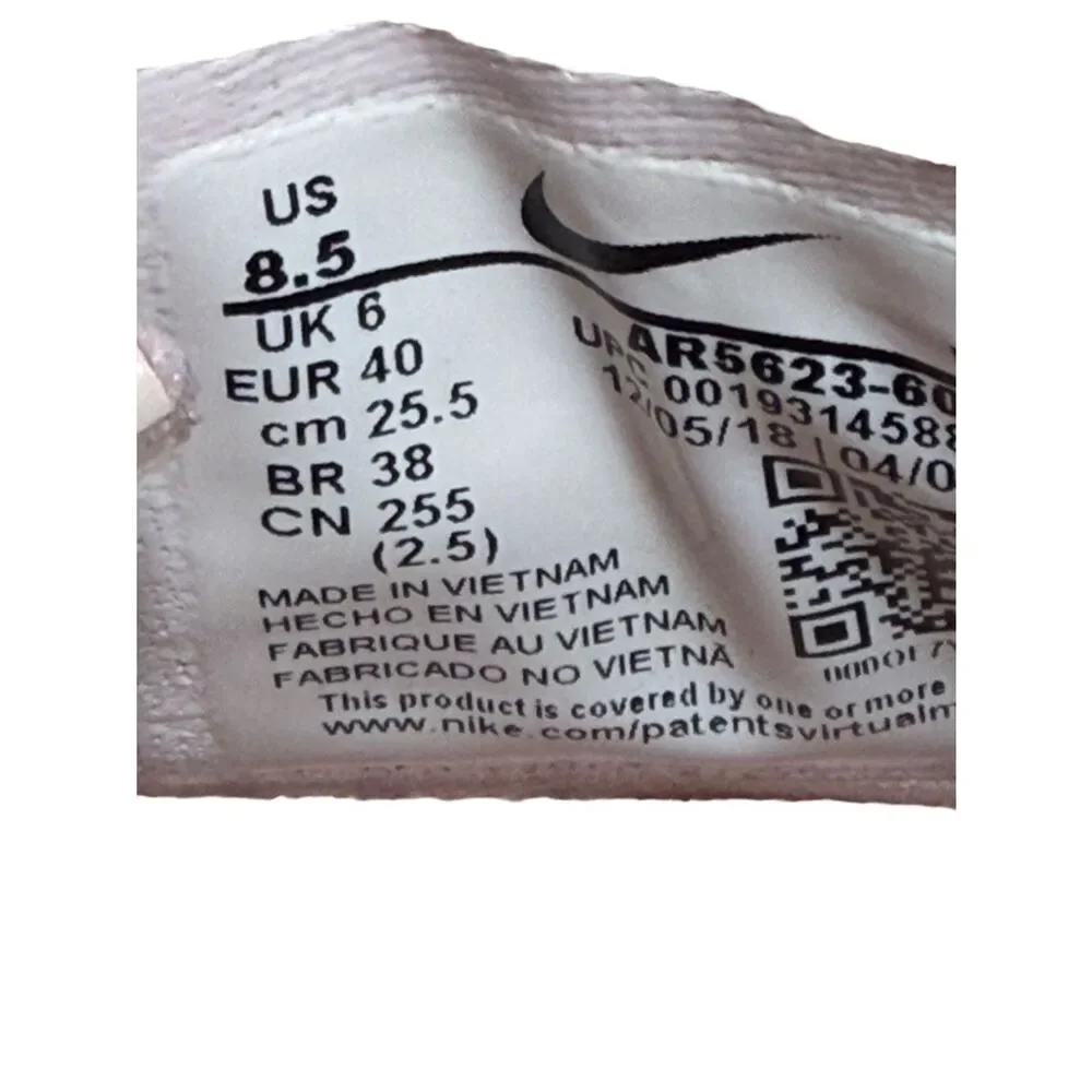 Nike Women’s Pink and Cream Athletic Trainer